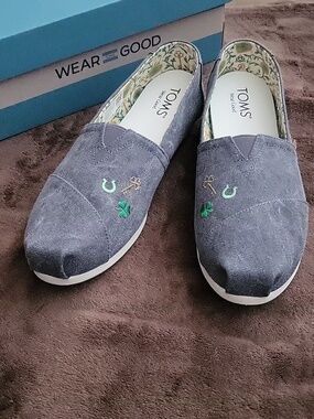 TOMS Gray Suede Slip-Ons with Green Lucky Embroidery